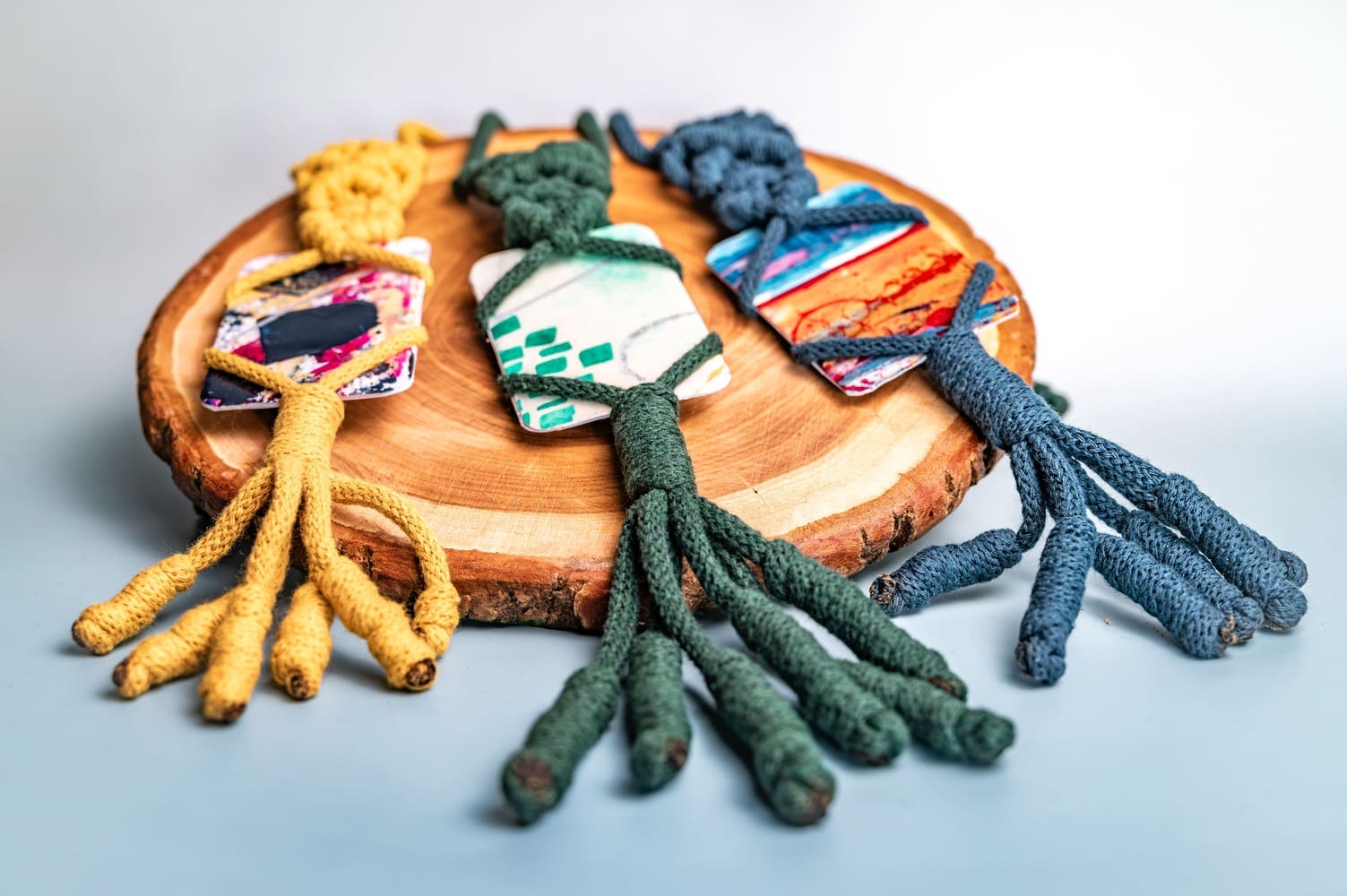 Unique amulet with intuitive painting and cotton macramé knot