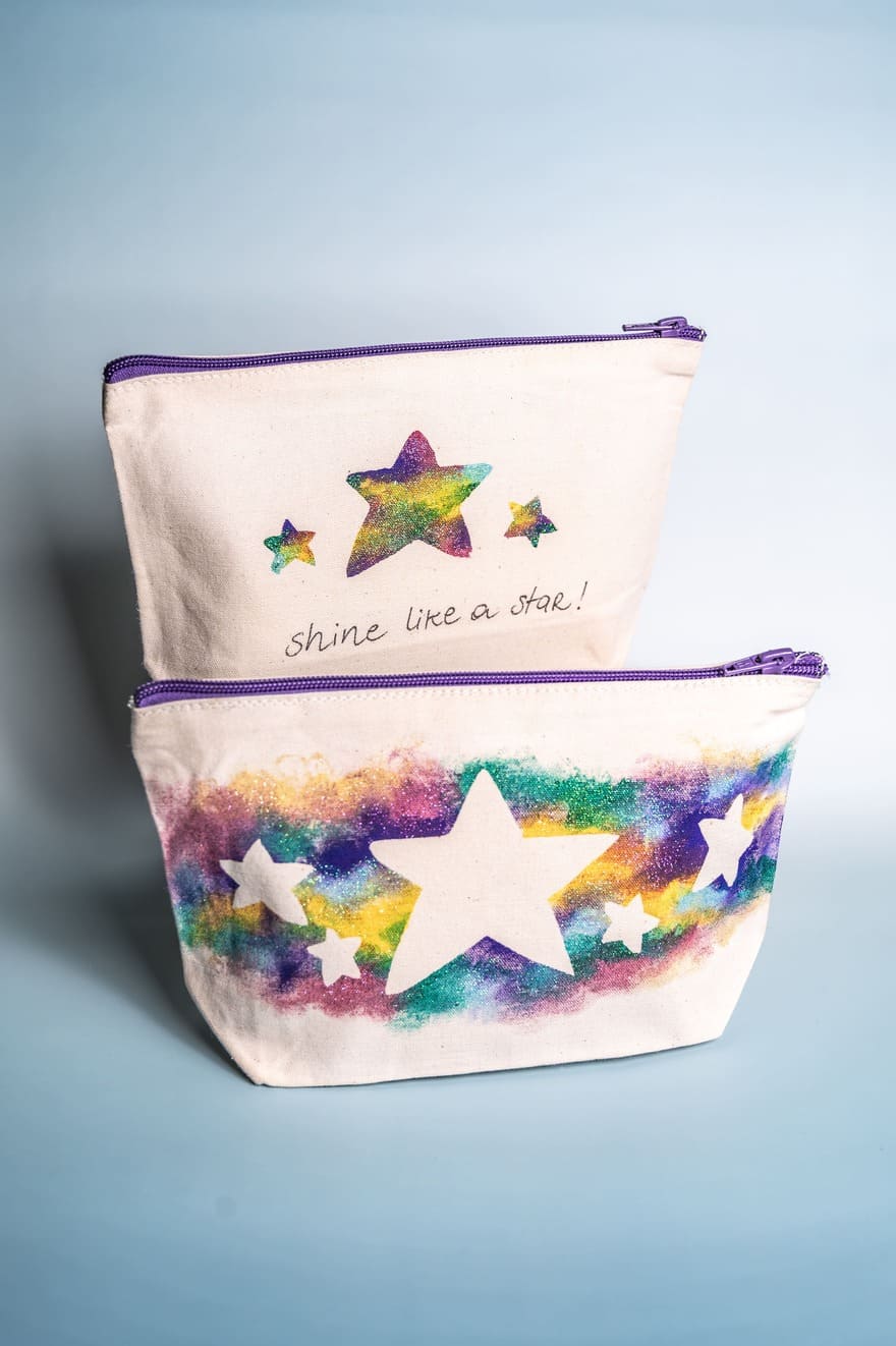 Hand-painted beauty case with vibrant colors and artistic motifs