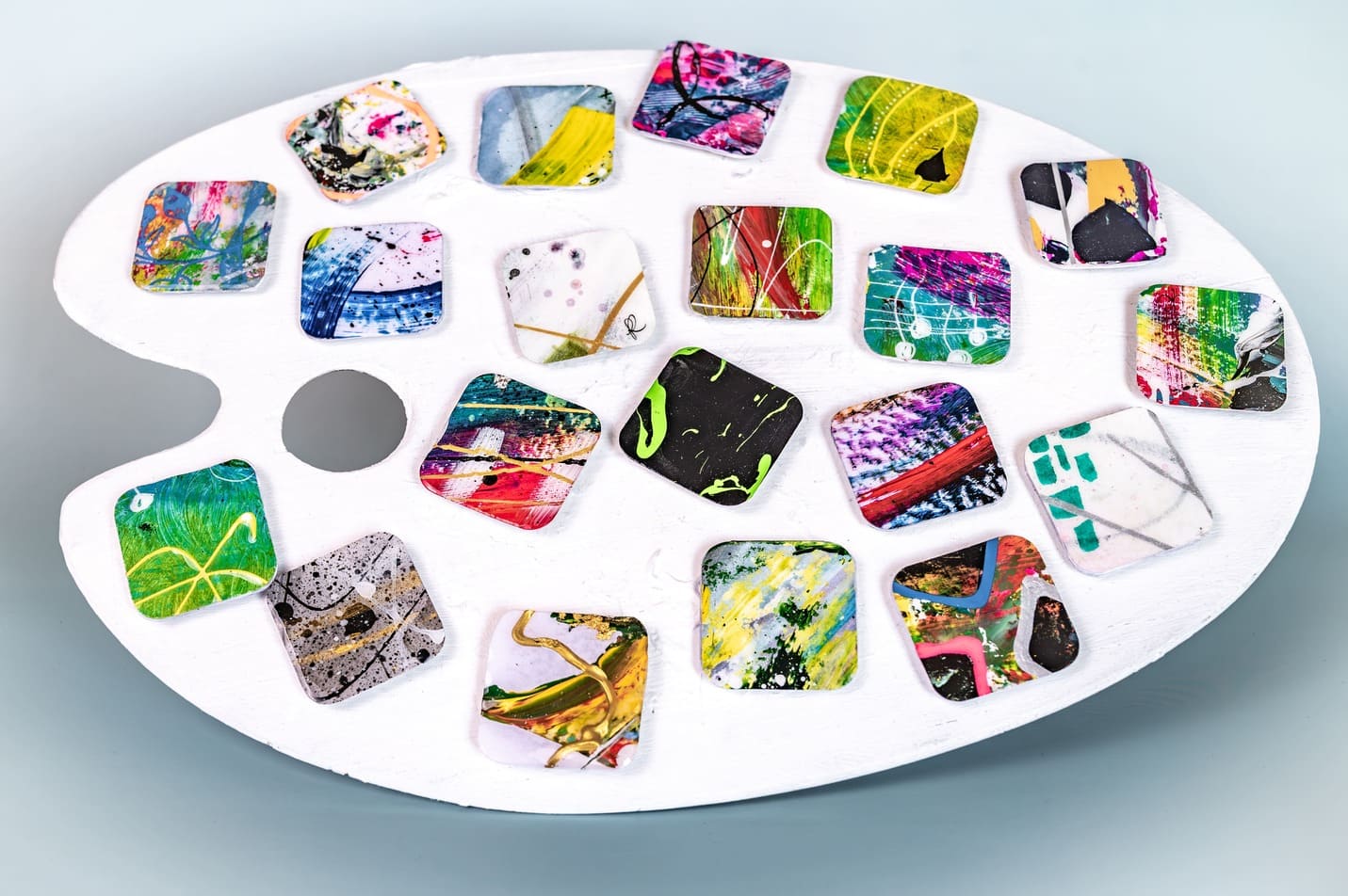 Artistic magnets hand-painted with colorful motifs