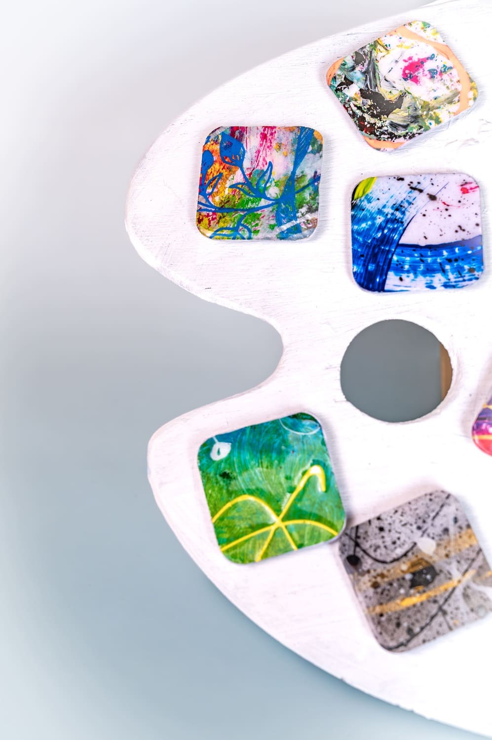 Artistic magnets hand-painted with colorful motifs