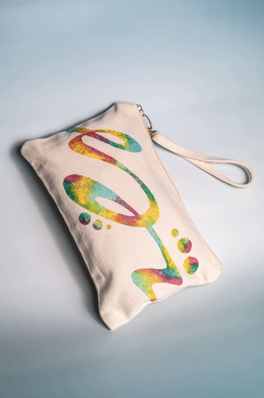 Unique pochette with colorful motifs and flowing shapes
