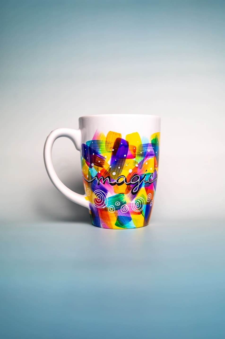 Artistic mug with unique textures and vibrant colors